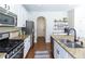 Modern kitchen with granite countertops and stainless steel appliances at 6125 Allison Rd, Cumming, GA 30040