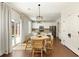 Eat-in kitchen with stainless appliances, granite countertops and backyard views at 6125 Allison Rd, Cumming, GA 30040