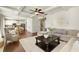 Bright living room with an open layout and hardwood floors at 6125 Allison Rd, Cumming, GA 30040