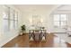 Bright home office with hardwood floors, white walls, and a stylish work desk at 6125 Allison Rd, Cumming, GA 30040