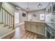 Well-designed kitchen area with island, wood floors, and modern amenities at 279 Scarborough Rd, Stockbridge, GA 30281