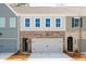 Charming townhome exterior featuring a brick facade and attached garage at 412 Carrera Ln, Acworth, GA 30102