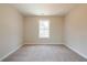 Neutral bedroom with carpet and a window providing natural light at 417 Carrera Ln, Acworth, GA 30102