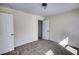 Neutral bedroom featuring plush carpeting, ample closet space, and natural light creating a tranquil and comfortable atmosphere at 1230 Scenic Brook Sw Trl, Conyers, GA 30094