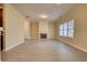 Spacious living room featuring fireplace, large windows, and neutral decor at 8138 Brookbend Dr, Douglasville, GA 30134