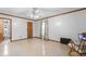 Spacious bedroom with tile floors, a ceiling fan, and ample natural light at 349 Asa Moseley Rd, Stockbridge, GA 30281