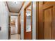 Hallway showing the wood trim, bathroom and kitchen at 349 Asa Moseley Rd, Stockbridge, GA 30281