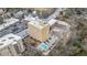 Stunning aerial view showcases building with a pool, parking and river views, close to traffic routes and shopping at 2285 Peachtree Ne Rd # 1107, Atlanta, GA 30309