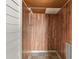 View of hallway with wood-look vinyl flooring and ceiling access at 2285 Peachtree Ne Rd # 1107, Atlanta, GA 30309