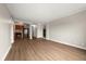 The living room features neutral walls, wood flooring and entrances to the kitchen and rooms at 2285 Peachtree Ne Rd # 1107, Atlanta, GA 30309