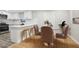 Modern kitchen features white cabinets, a breakfast bar and a dining area at 2549 Fontaine Cir, Decatur, GA 30032