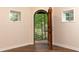 Basement doorway leading to nature, flanked by bright, white walls at 4421 Paradise Cir, Vinings, GA 30339