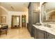 Open bathroom featuring tile floors, lots of storage, and a soaking tub at 4421 Paradise Cir, Vinings, GA 30339