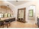 Bright bathroom has tile floors, a soaking tub, and a large decorative mirror at 4421 Paradise Cir, Vinings, GA 30339