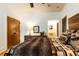 Cozy bedroom featuring natural wood furniture and Southwestern-inspired decor at 4421 Paradise Cir, Vinings, GA 30339