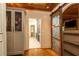 View of a wardrobe closet with unique sliding metal door with wood trim at 4421 Paradise Cir, Vinings, GA 30339