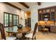 A dining area is furnished with a round table, wooden chairs, and a built-in desk at 4421 Paradise Cir, Vinings, GA 30339