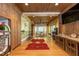 Spacious game room featuring a jukebox, bar seating, and access to a rec area at 4421 Paradise Cir, Vinings, GA 30339