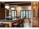Bright kitchen area with a large island with seating and views of the dining area at 4421 Paradise Cir, Vinings, GA 30339