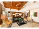 Spacious living room with wood beams, fireplace, and an open layout perfect for entertaining at 4421 Paradise Cir, Vinings, GA 30339