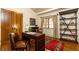 Traditional home office with wood desk, doors, and shelving at 4421 Paradise Cir, Vinings, GA 30339