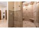 Large tile shower with dual shower heads and built in seating at 4421 Paradise Cir, Vinings, GA 30339