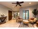 Comfortable sitting area with tile flooring, stylish chairs, and a view of the outdoors at 4421 Paradise Cir, Vinings, GA 30339