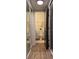 Well-lit bathroom with tile floors, modern toilet, and a neutral color scheme, creating a fresh and clean look at 5674 Kingsport Dr # 4, Atlanta, GA 30342
