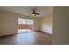 Bedroom featuring wood-look floors and sliding glass doors that open to the backyard at 5674 Kingsport Dr # 4, Atlanta, GA 30342