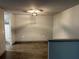 Empty dining room with modern flooring and lighting fixtures, ready for personalization at 3204 Fairington Village Dr, Lithonia, GA 30038