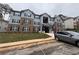 Apartment building exterior with brick and siding, black shutters, and visible parking area at 3204 Fairington Village Dr, Lithonia, GA 30038