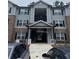 Apartment building entrance with covered walkway and stairs, showcasing exterior details at 3204 Fairington Village Dr, Lithonia, GA 30038
