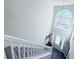 View of the foyer showing the stairs and a window that lets in natural light at 5175 Bridle Point Pkwy, Snellville, GA 30039