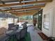 Backyard patio featuring outdoor furniture and a decorative wall at 5175 Bridle Point Pkwy, Snellville, GA 30039