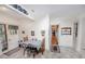Sunlit kitchen with breakfast nook, featuring tile floors and classic design elements at 970 E Main St, Canton, GA 30114