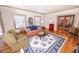 Inviting living room showcasing hardwood floors, large windows, and cozy furniture at 970 E Main St, Canton, GA 30114