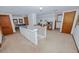 Spacious loft area with seating, desk, and natural light from dormer window at 970 E Main St, Canton, GA 30114