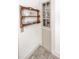 Charming pantry nook with wooden shelves and cabinet storage for kitchen essentials at 970 E Main St, Canton, GA 30114
