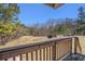 Backyard view from a wooden deck overlooking natural scenery at 4065 Thaxton Rd, Atlanta, GA 30349
