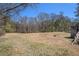 A large backyard area with potential for landscaping, gardening, and recreation at 4065 Thaxton Rd, Atlanta, GA 30349