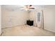 Bedroom with carpet, a ceiling fan and window at 4065 Thaxton Rd, Atlanta, GA 30349