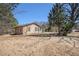 Cozy single-story home featuring three windows and a spacious front yard at 4065 Thaxton Rd, Atlanta, GA 30349