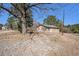 A welcoming single-story home with a front yard and mature trees for shade and appeal at 4065 Thaxton Rd, Atlanta, GA 30349
