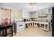 Functional kitchen with essential appliances and empty shelving at 4065 Thaxton Rd, Atlanta, GA 30349