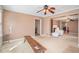 Spacious living room with a ceiling fan and visible access to the next room at 4065 Thaxton Rd, Atlanta, GA 30349