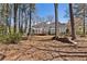 Large, wooded backyard with deck and mature trees at 741 Bentwood Trce, Alpharetta, GA 30005
