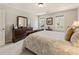 Comfortable bedroom with neutral walls, double windows, and ample closet space at 741 Bentwood Trce, Alpharetta, GA 30005