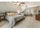 Large bedroom with a sitting area, vaulted ceiling, and ample natural light at 741 Bentwood Trce, Alpharetta, GA 30005