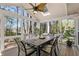 Charming sunroom with ceiling fan, skylight, multiple windows, and views of the surrounding trees at 741 Bentwood Trce, Alpharetta, GA 30005