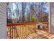 Backyard includes a wooden patio with a beautiful view of wooded trees at 1378 Penhurst Dr, Lawrenceville, GA 30043